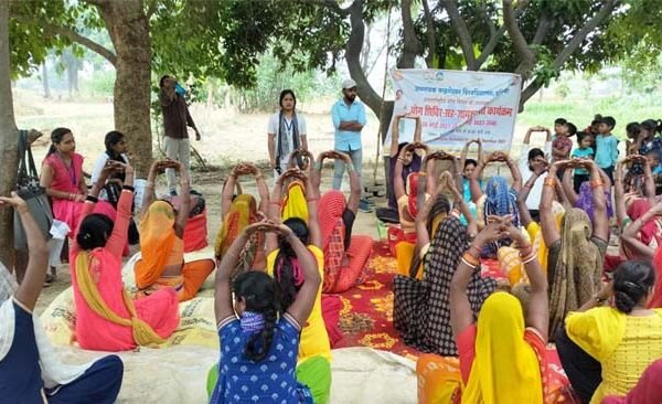 Social work department of JNCU organized yoga camp in villages