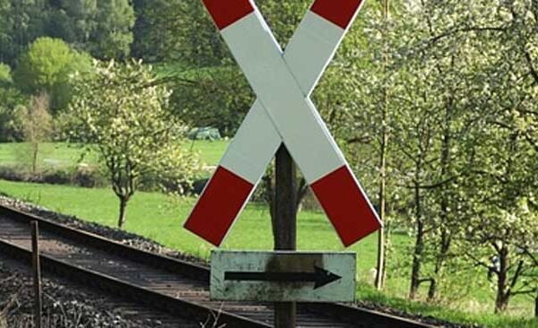 A middle-aged man seriously injured in the collision between two bikes near the railway crossing.
