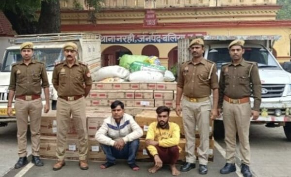 263 boxes of liquor loaded in two pickup vehicles, two vicious smugglers arrested