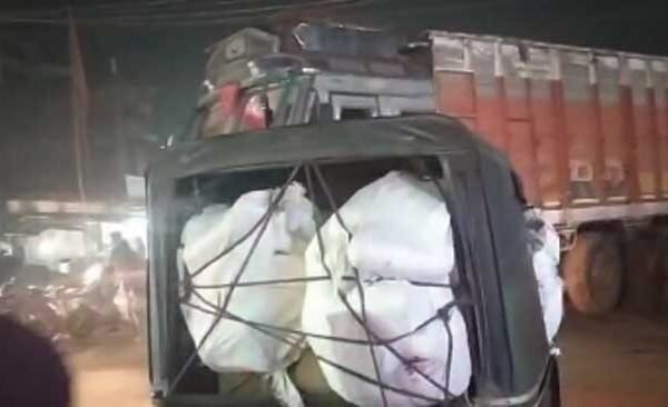 Auto hits parked truck, driver injured