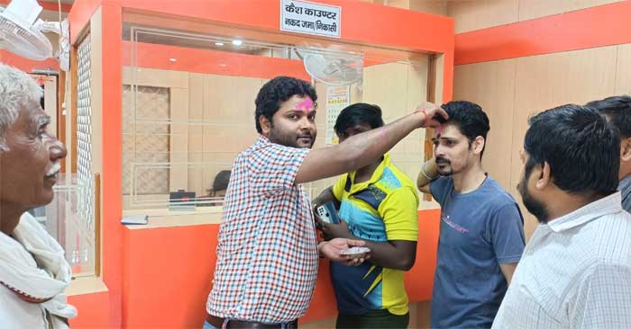 Manager celebrated Holi festival with bank account holders